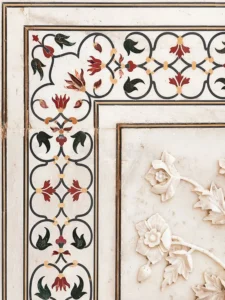 Floral parchin kari stone inlay in white marble at the Taj Mahal